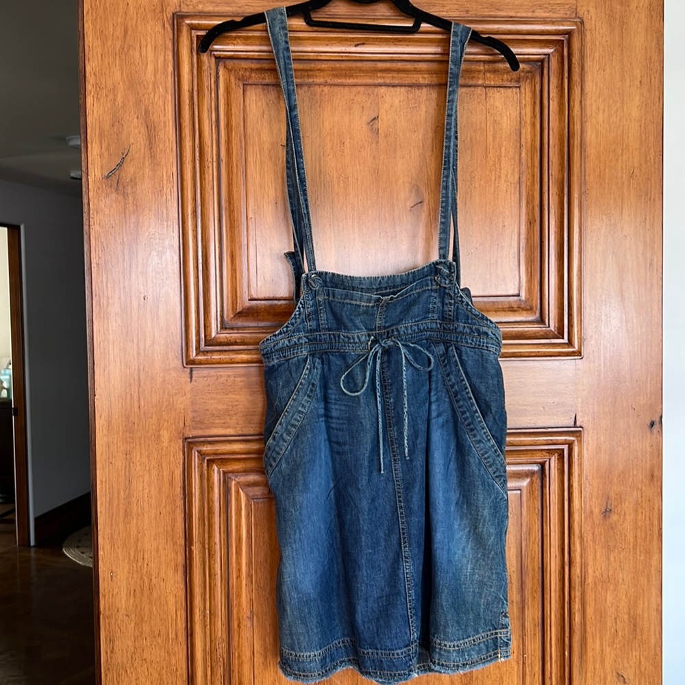 Blue denim coverall jean skirt. Size US Medium